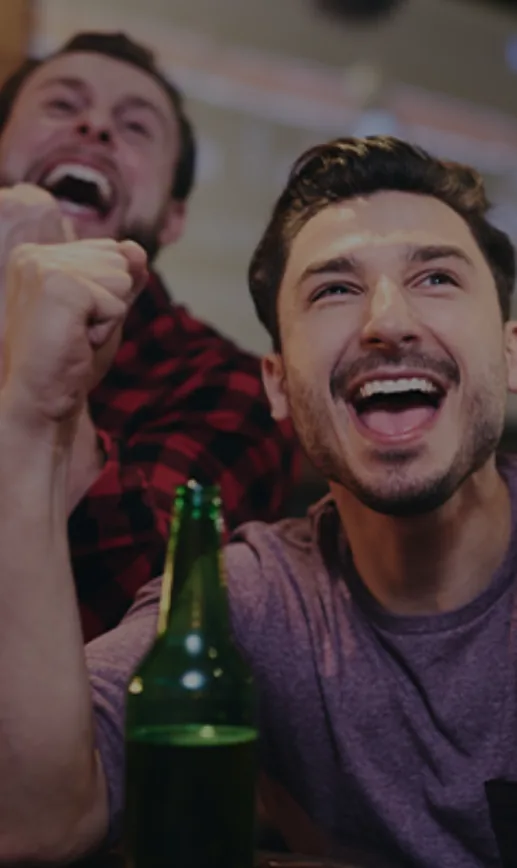 Guests celebrating during game night at The Grog