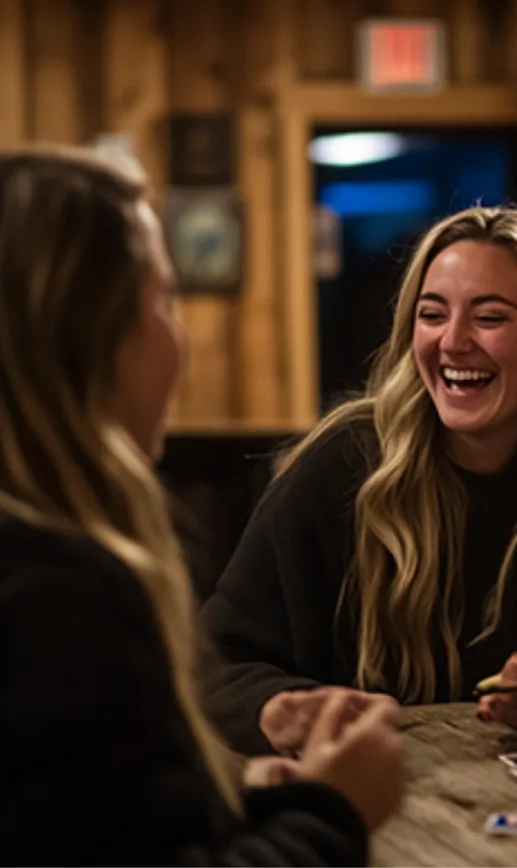 Friends enjoying trivia night at The Grog