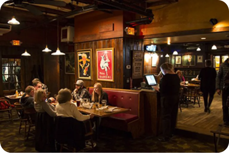 Guests dining inside The Grog